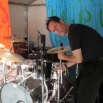 Luisa Marshall's drummer Steve Marshall sets up before the Harmony Arts Festival 2012.