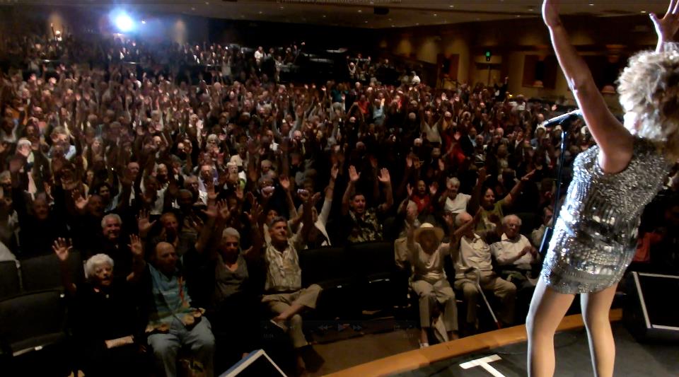Luisa Marshall and her audience with their hands up at the Boca Raton Theatre. Day 3 of her US Tour January 2013 in Florida.