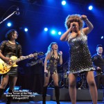 Tina Turner Tribute Artist, Luisa Marshall at the Chevrolet Performance Stage at the PNE with her guitarist Kim and dancers Maiko and Leandro.