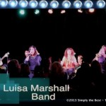 Naomi Chan of the Luisa Marshall Band center stage.