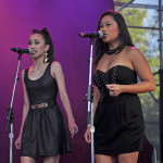 Tina Turner Tribute Artist, Luisa Marshall back up singers Zenia Marshall and Naomi Chan at the Chevrolet Performance Stage at the PNE.